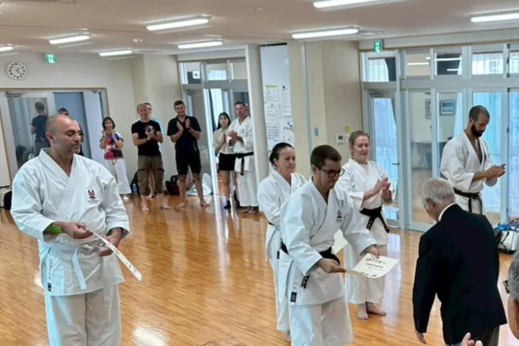 Photo of grade/DAN certificates and belts